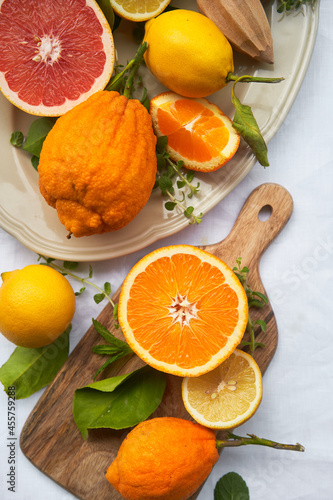 Assortment of citrus fruits on a table photo