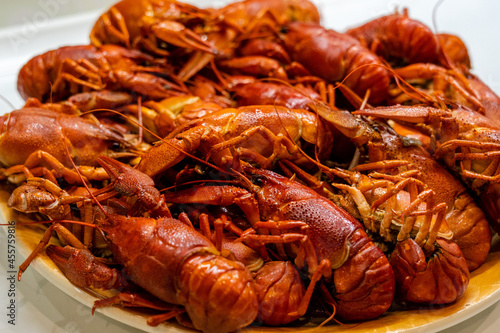 Delicious boiled crayfish/crawfish on a plate on a kitchen