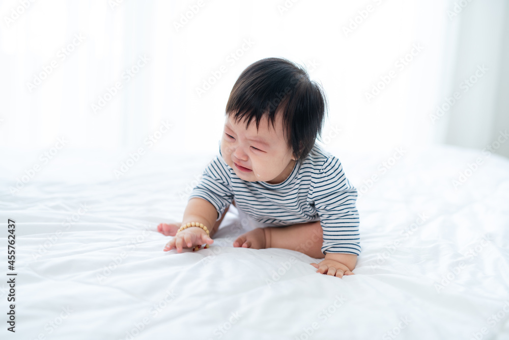 Crying Asian girl 6 months old Crying Asian girl 6 months old