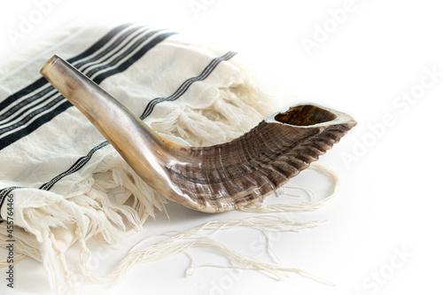 Photos Нom Kippur. Tallit, shofar on a white background. Isolated