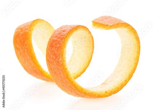 Orange spiral zest isolated on a white background, orange peel.