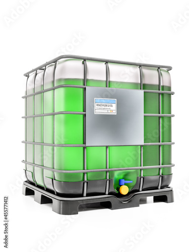 Industrial plastic container with green ethylene glycol fluid on white background photo