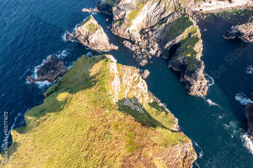 Aerial view of Tormore Island the hidden stack and Cobblers tower by Port between Ardara and Glencolumbkille in County Donegal