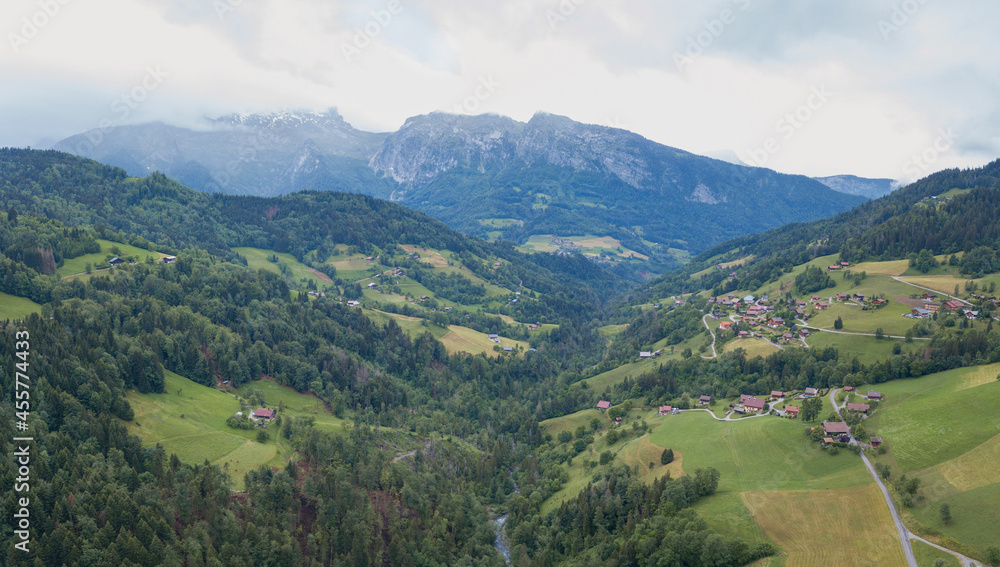 green alpine valley aerial view, french Alps green alpine valley aerial view, french Alps