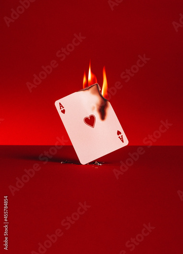 Poker card on flames.