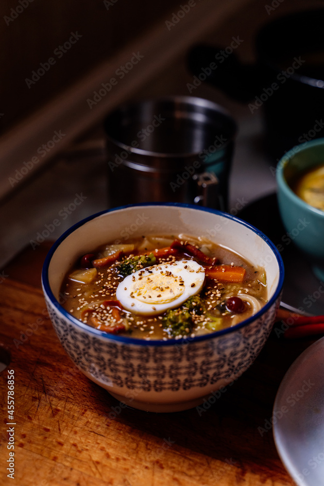 Bowl with noodles ramen and egg on counter Bowl with noodles ramen and egg on counter