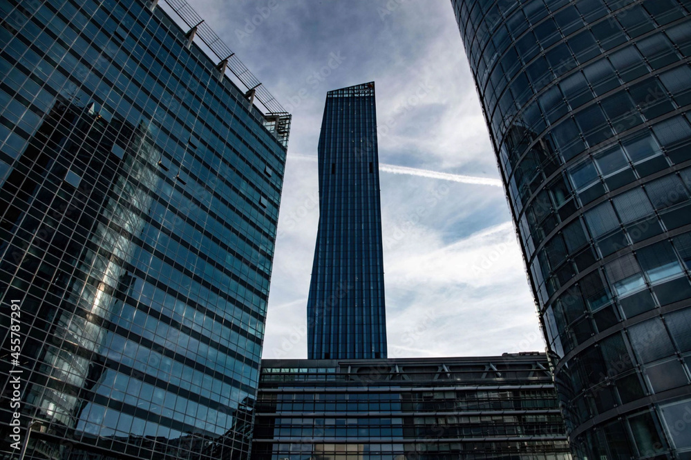 Fototapeta premium skyscraper silhouettes at the modern part of Vienna called Danube city in a low angle view