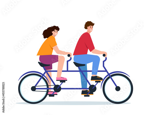 Young happy couple ride double tandem bike.
