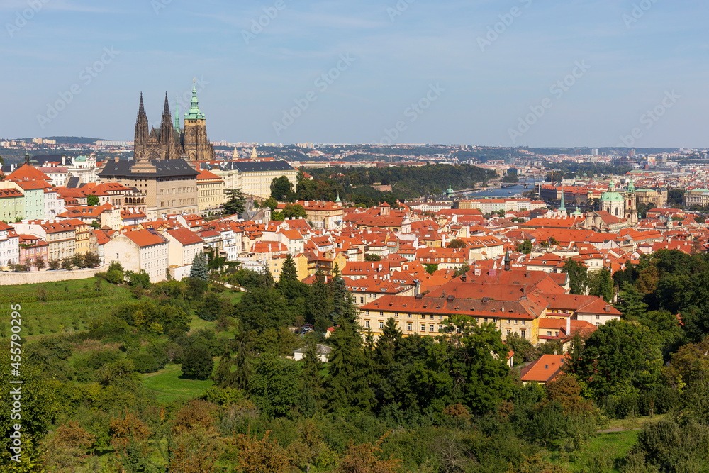 Autumn Prague City with gothic Castle and the colorful Nature with Trees from the Hill Petrin, Czech Republic