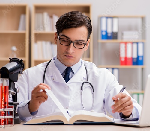 Young doctor studying medical education