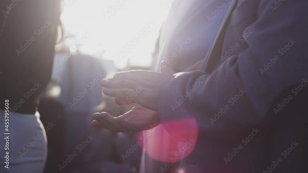 Applause. Men's hands clap, the palms of an adult are applauded outdoors during the day. Event at luxury polo or golf club. Congratulations on your victory. Applause. Men's hands clap, the palms of an adult are applauded outdoors during the day. Event at luxury polo or golf club. Congratulations on your victory.
