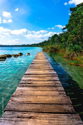 wooden bridge over the lake photo