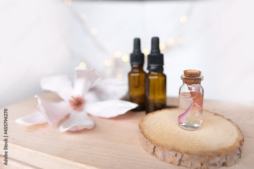oil, tincture, creating a new medicine from plants, gifts of nature, dietary supplements, magnolia flowers, concept science, natural medicine, pharmacology oil, tincture, creating a new medicine from plants, gifts of nature, dietary supplements, magnolia flowers, concept science, natural medicine, pharmacology