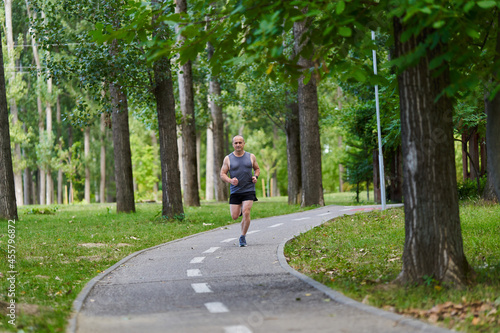 Marathon runner training in the park