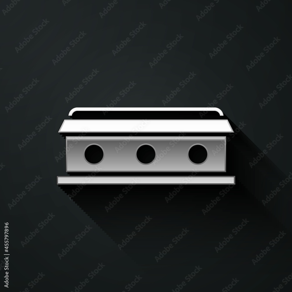 Obraz premium Silver Coffin with christian cross icon isolated on black background. Happy Halloween party. Long shadow style. Vector