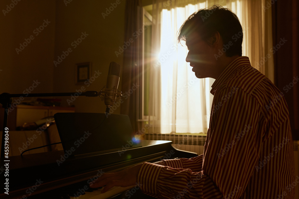Man Singing And Playing The Piano Man Singing And Playing The Piano