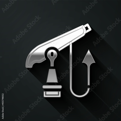 Silver Fishing harpoon icon isolated on black background. Fishery manufacturers for catching fish under water. Diving underwater equipment. Long shadow style. Vector