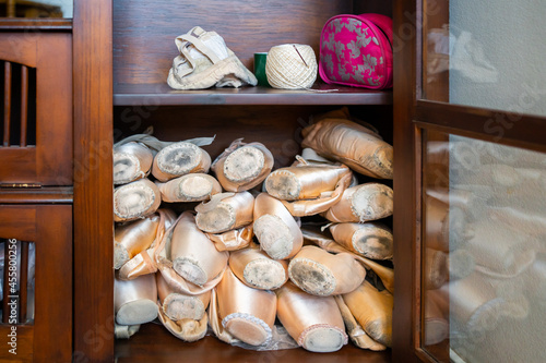 Pile Of Used Ballet Pointe Shoes Of A Ballerina.