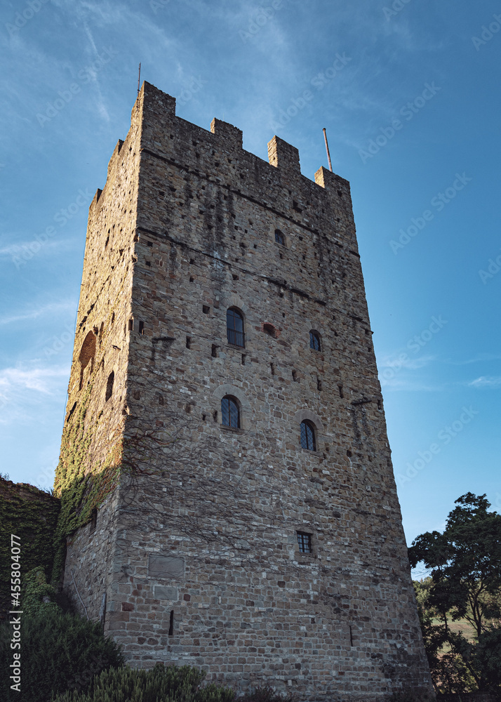ancient medieval castle on the Tuscan hills in Italy ancient medieval castle on the Tuscan hills in Italy