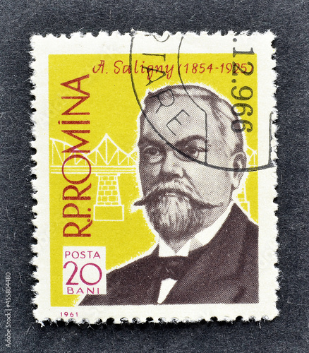 Cancelled postage stamp printed by Romania, that shows portrait of engineer A. Saligny, circa 1961. photo