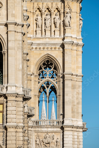 Detail of windows and towers of the Vienna city hall building with neo-gothic architectural style