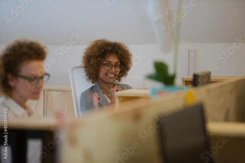 Office workers sititing at desk photo