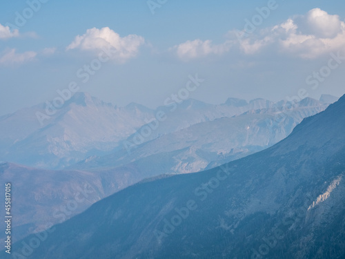 Abstract landscape closeup of layers of blue mountains in the Colorado Rockies.