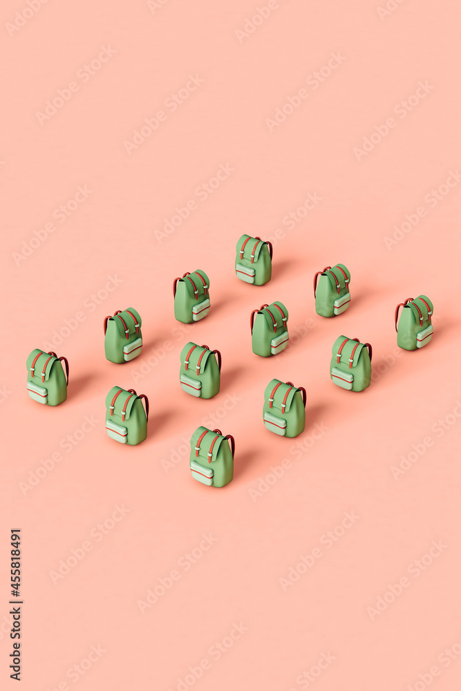 Green adventurer's backpack on pink background Green adventurer's backpack on pink background