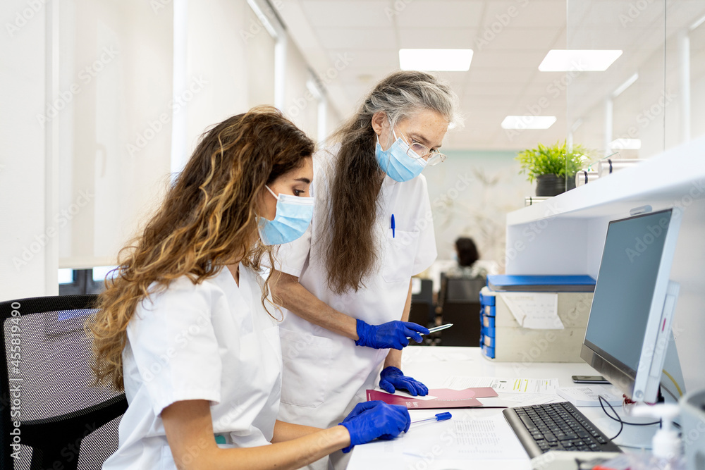 Medical Workers Using Computer Medical Workers Using Computer