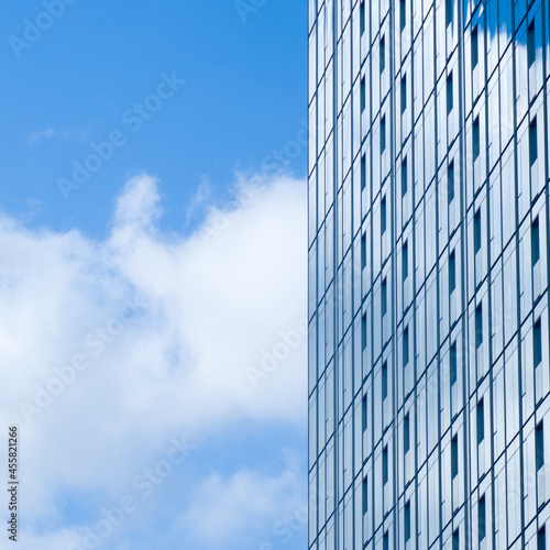 clouds reflecting on skyscraper windows