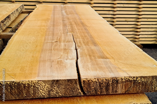 Texture and structure of wood close-up. Unedged alder board