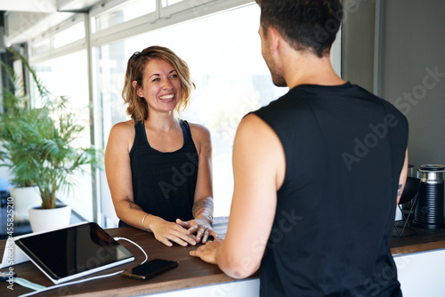 Smiling woman at reception. photo