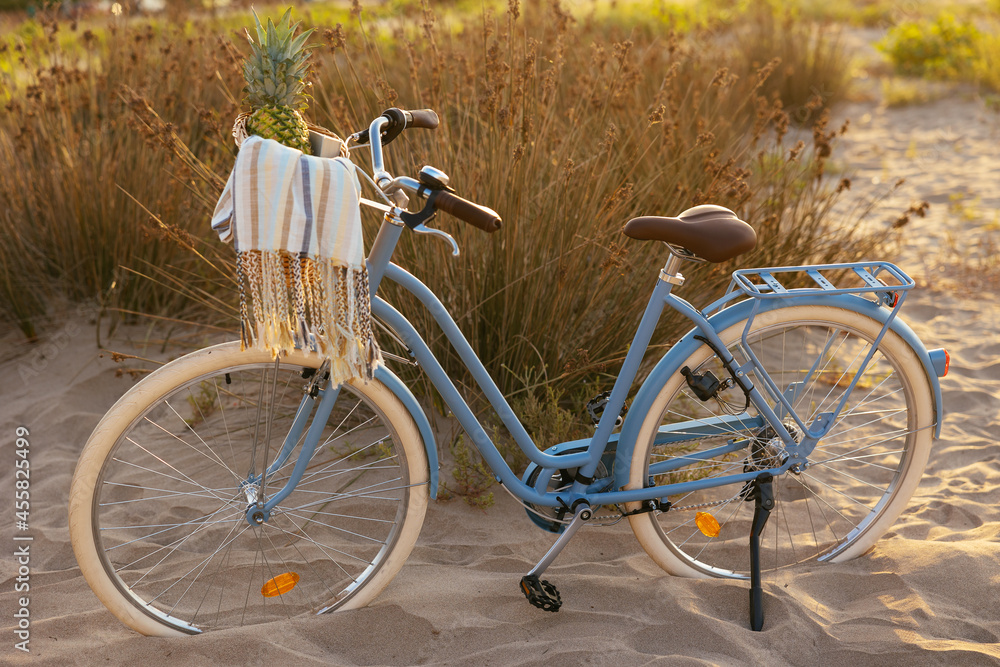 Retro bike on sandy beach Retro bike on sandy beach