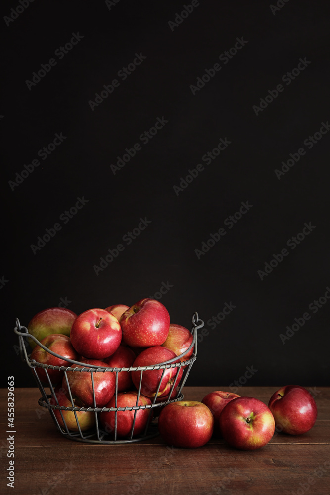 Ripe red apples on wooden table Ripe red apples on wooden table