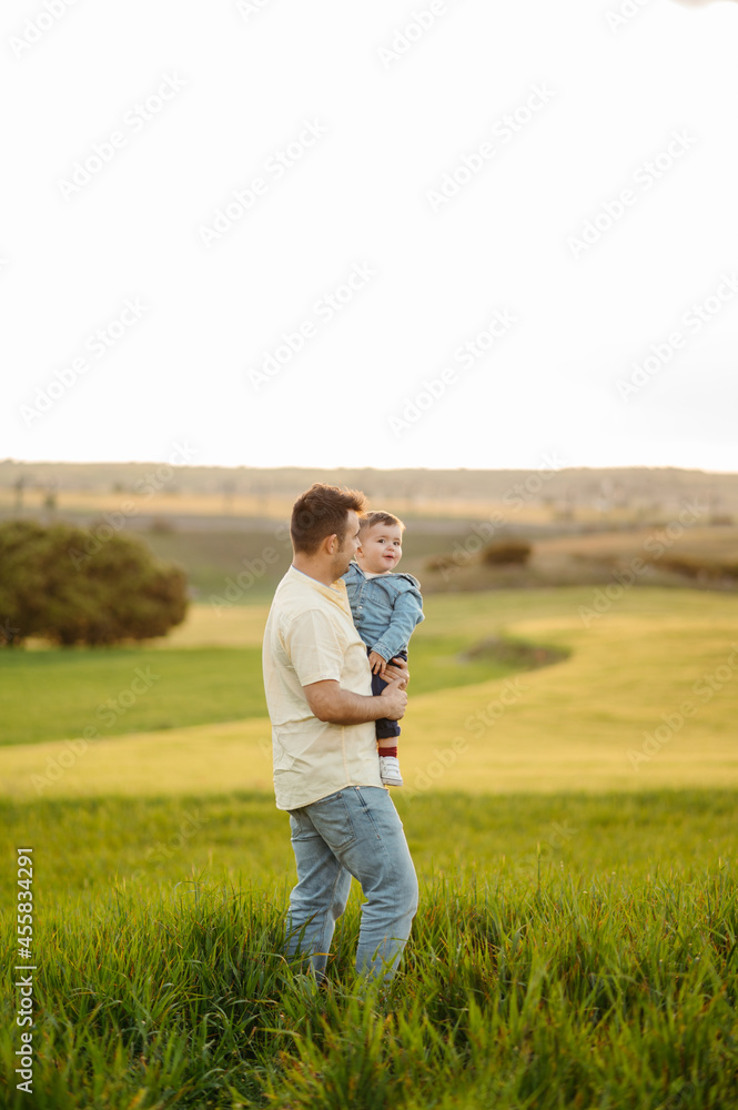 Father with son in field