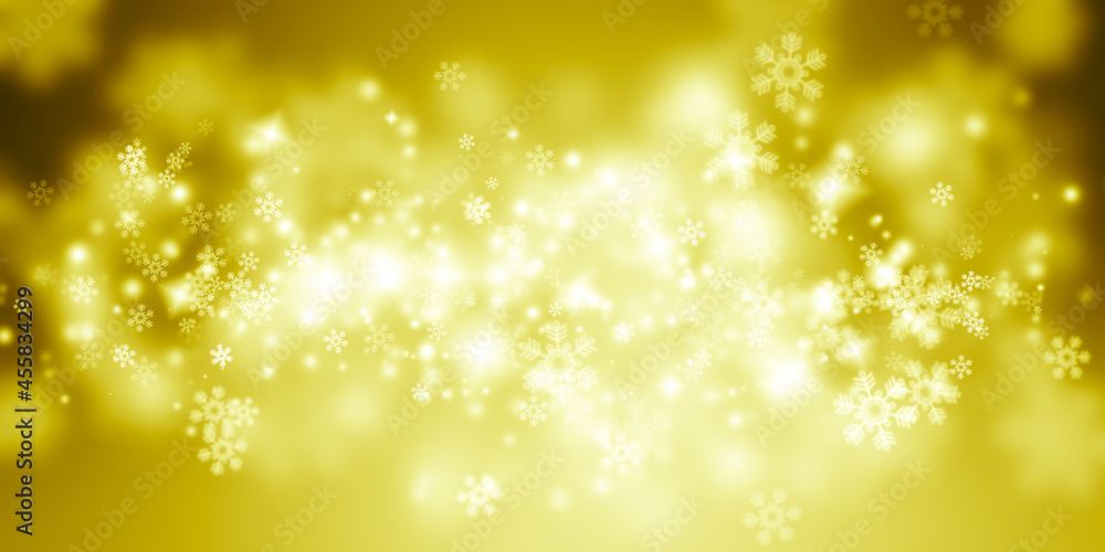 Golden rays and sparkles or glitter lights. Merry Christmas festive background. Defocused circle bokeh or particles Golden rays and sparkles or glitter lights. Merry Christmas festive background. Defocused circle bokeh or particles