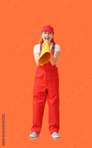 Female worker shouting into...