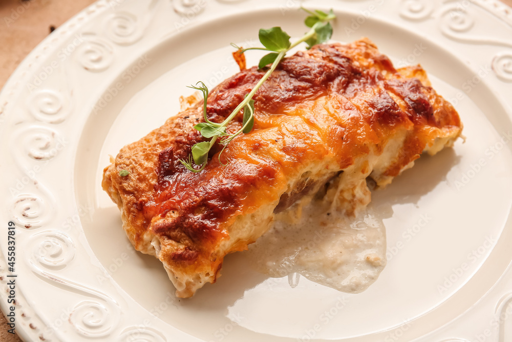 Plate with piece of delicious casserole with minced meat, closeup Plate with piece of delicious casserole with minced meat, closeup