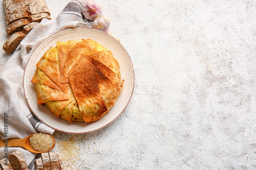 Slika na platnu Plate with tasty Shah Pilaf on light background