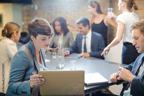 Business people talking in conference room meeting