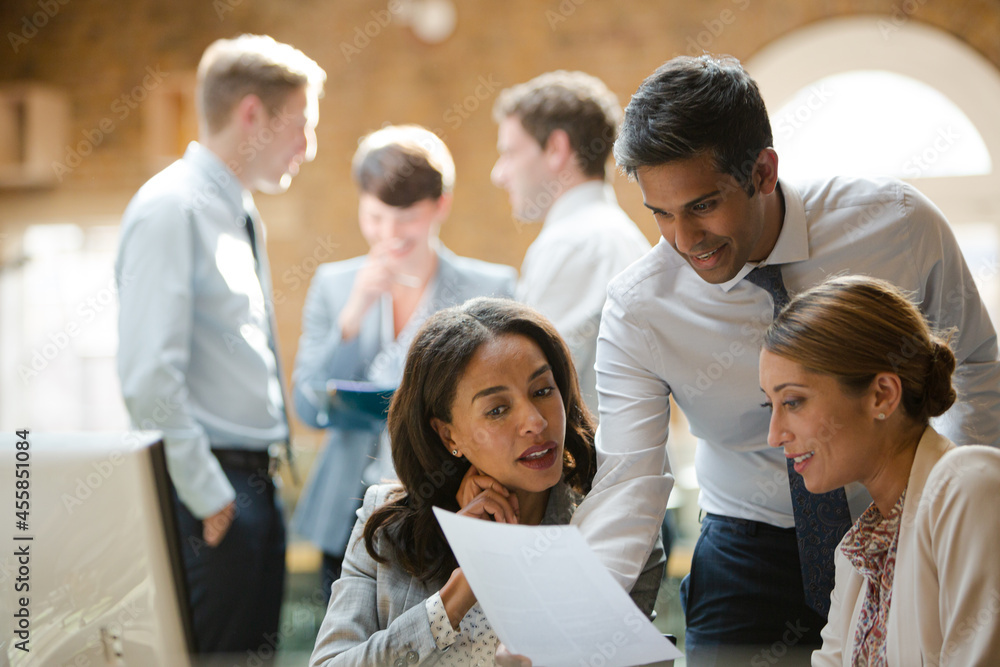 Business people talking in conference room Business people talking in conference room