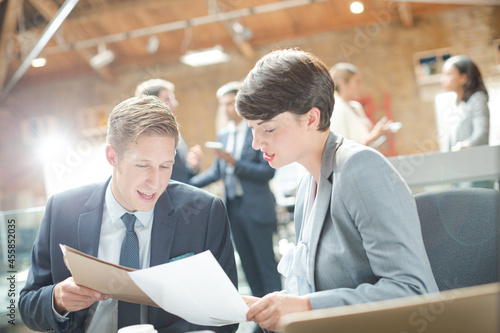 Business people working at laptop