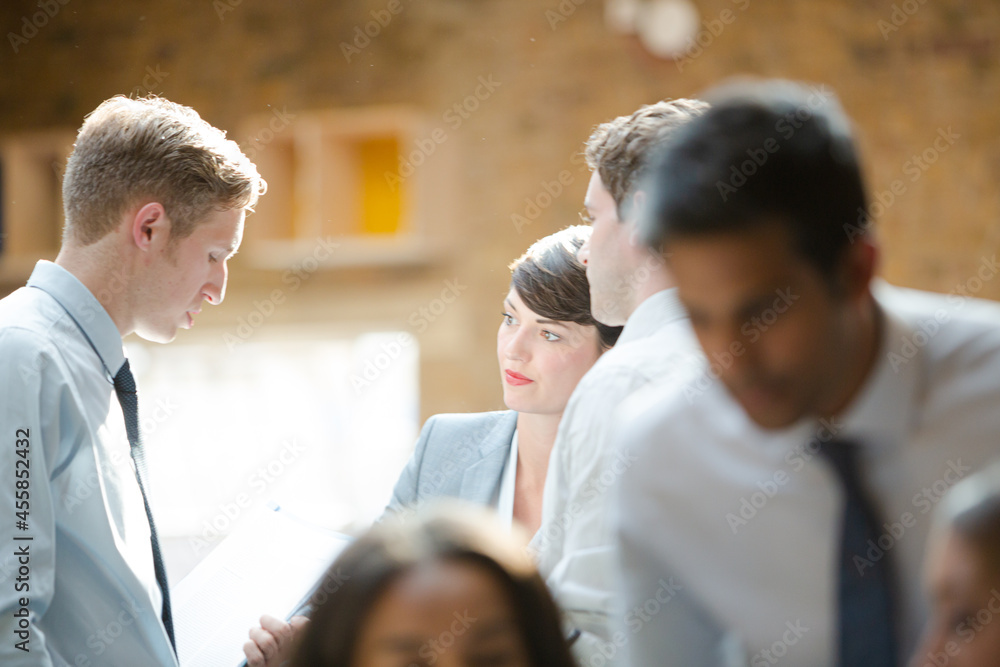Business people talking in conference room Business people talking in conference room