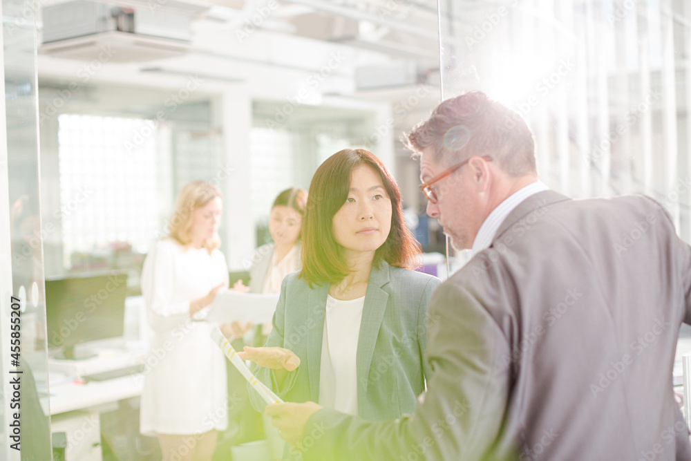 Business people talking in office Business people talking in office