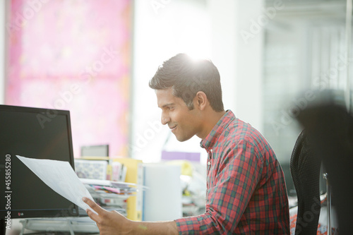 Fashion designer working at desk