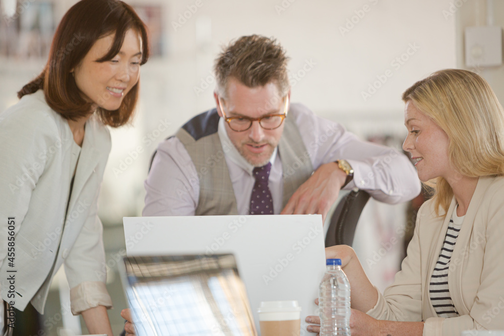 Fashion designers brainstorming in office Fashion designers brainstorming in office