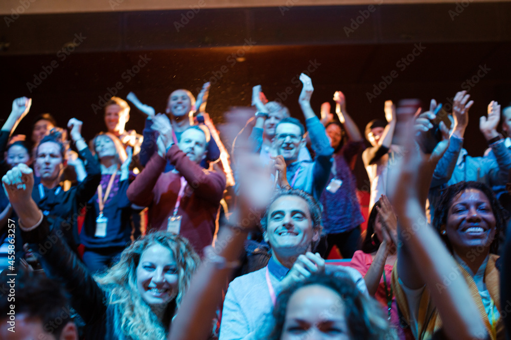 Enthusiastic audience cheering