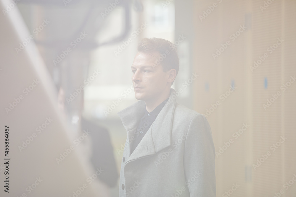 Fototapeta premium Man waiting in hall of auditorium