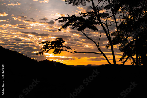 sunset, mountains, valleys, landscape, golden hour, orange sky.
blue and orange sky