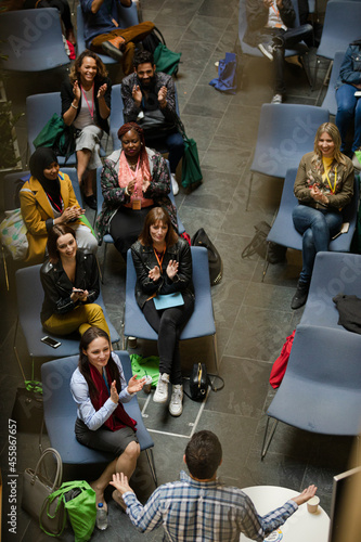 Conference audience clapping